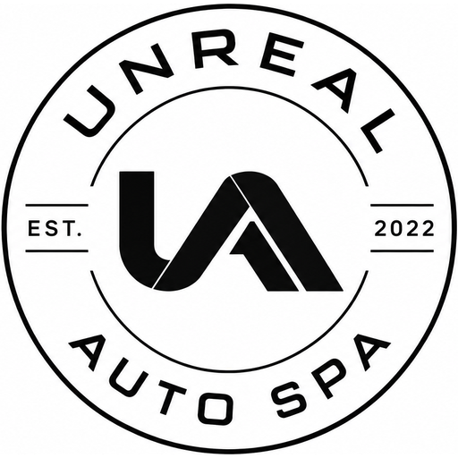 Unreal Auto Spa logo
