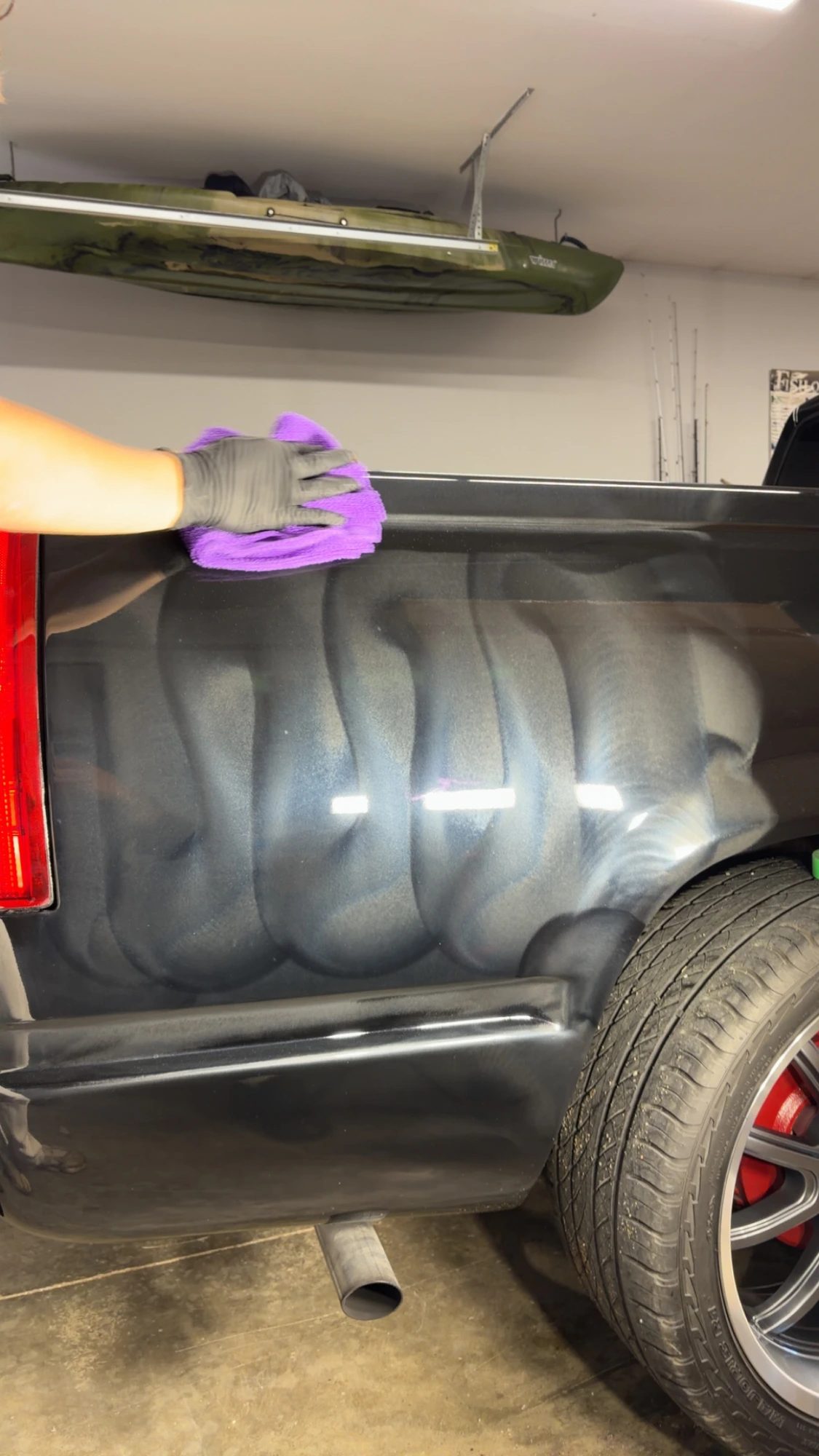 Hand-finishing a freshly decontaminated and polished truck panel by Unreal Auto Spa