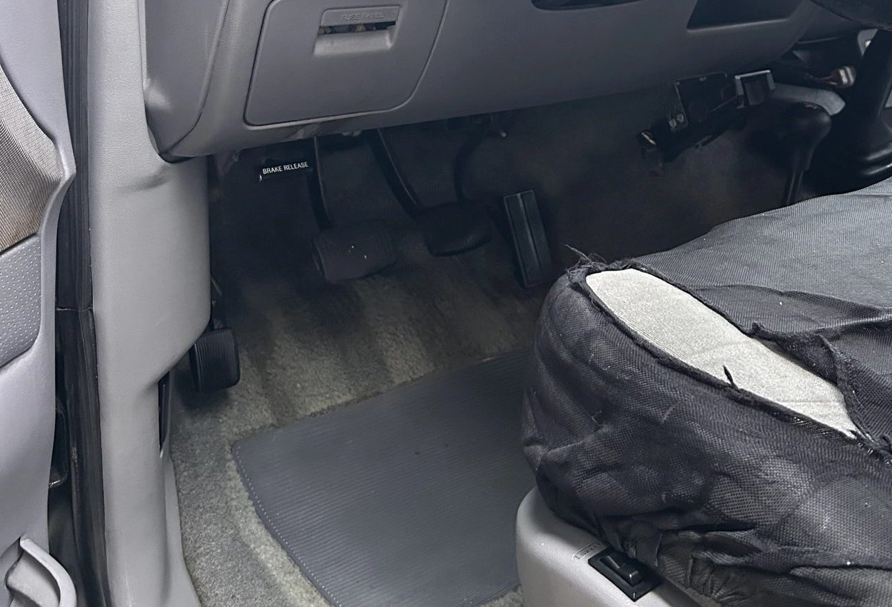 Clean driver footwell, pedals and carpet after a winter interior reset by Unreal Auto Spa
